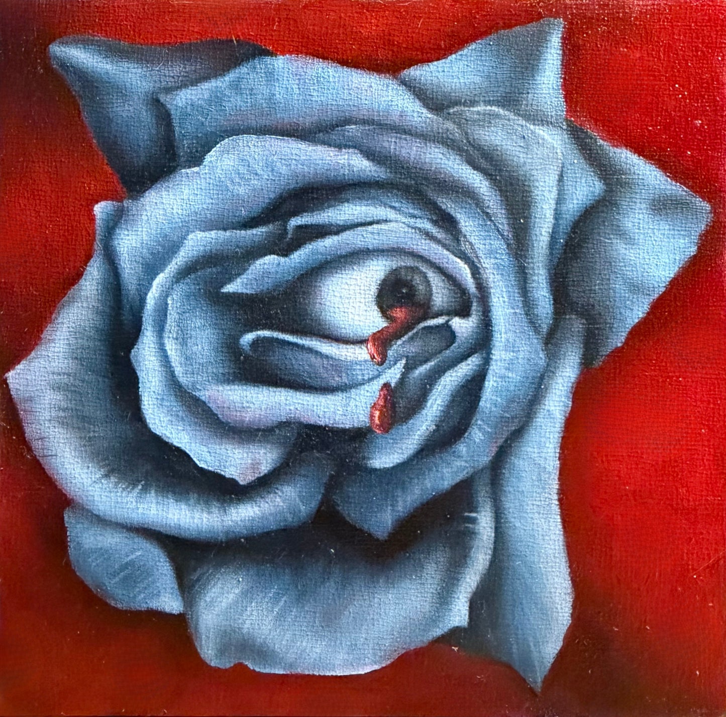 Greyscale rose with blue hue and eye in center on a red background