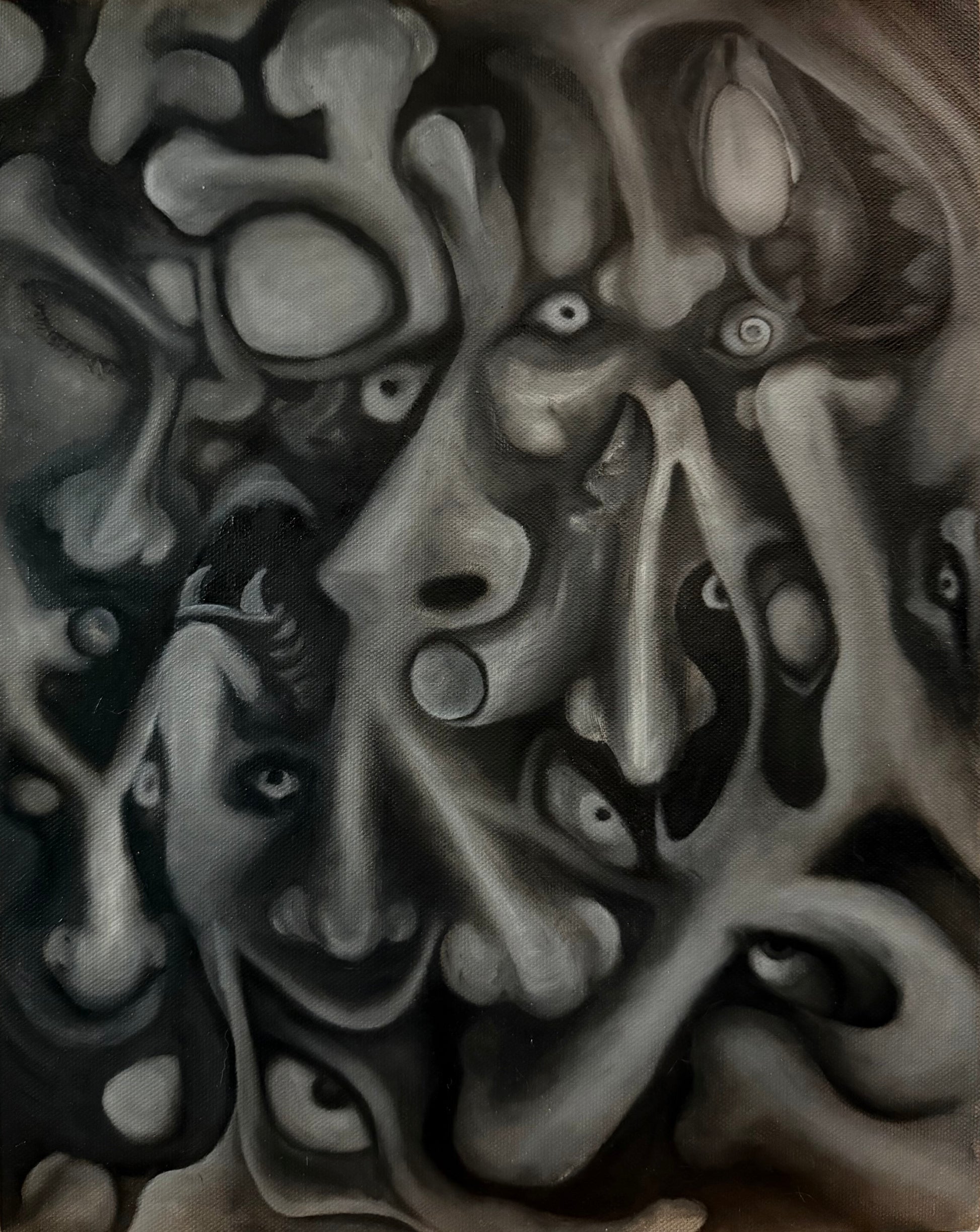 Abstract black and white artwork with distorted faces and organic shapes